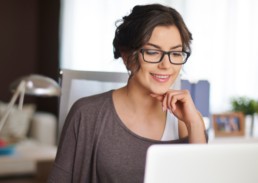girl looking at a computer screen